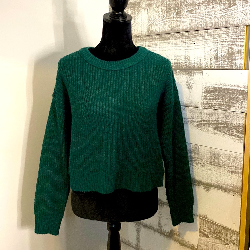 Green knitted sweater